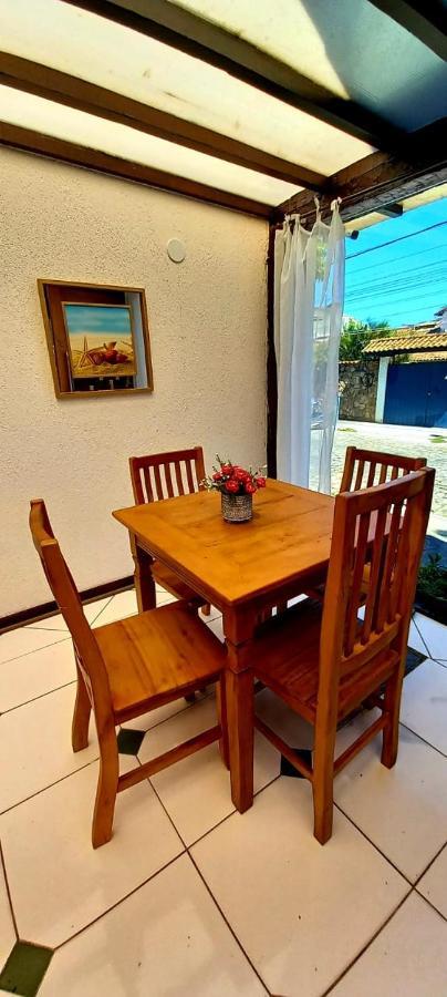 Bliss Hoteis Centro Búzios Exteriör bild A dining room table with four chairs