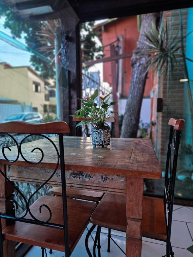 Bliss Hoteis Centro Búzios Exteriör bild A table and chair